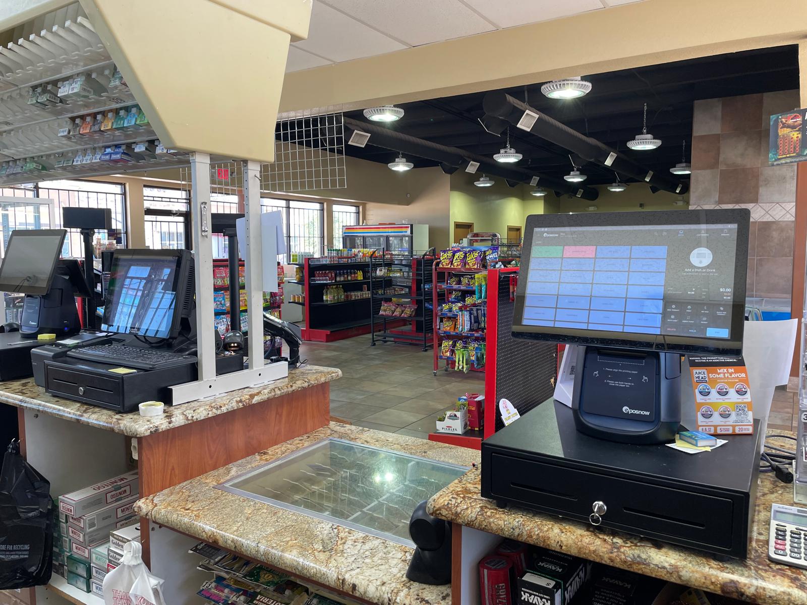 ZSM Express modern checkout counter with advanced POS technology and customer service area